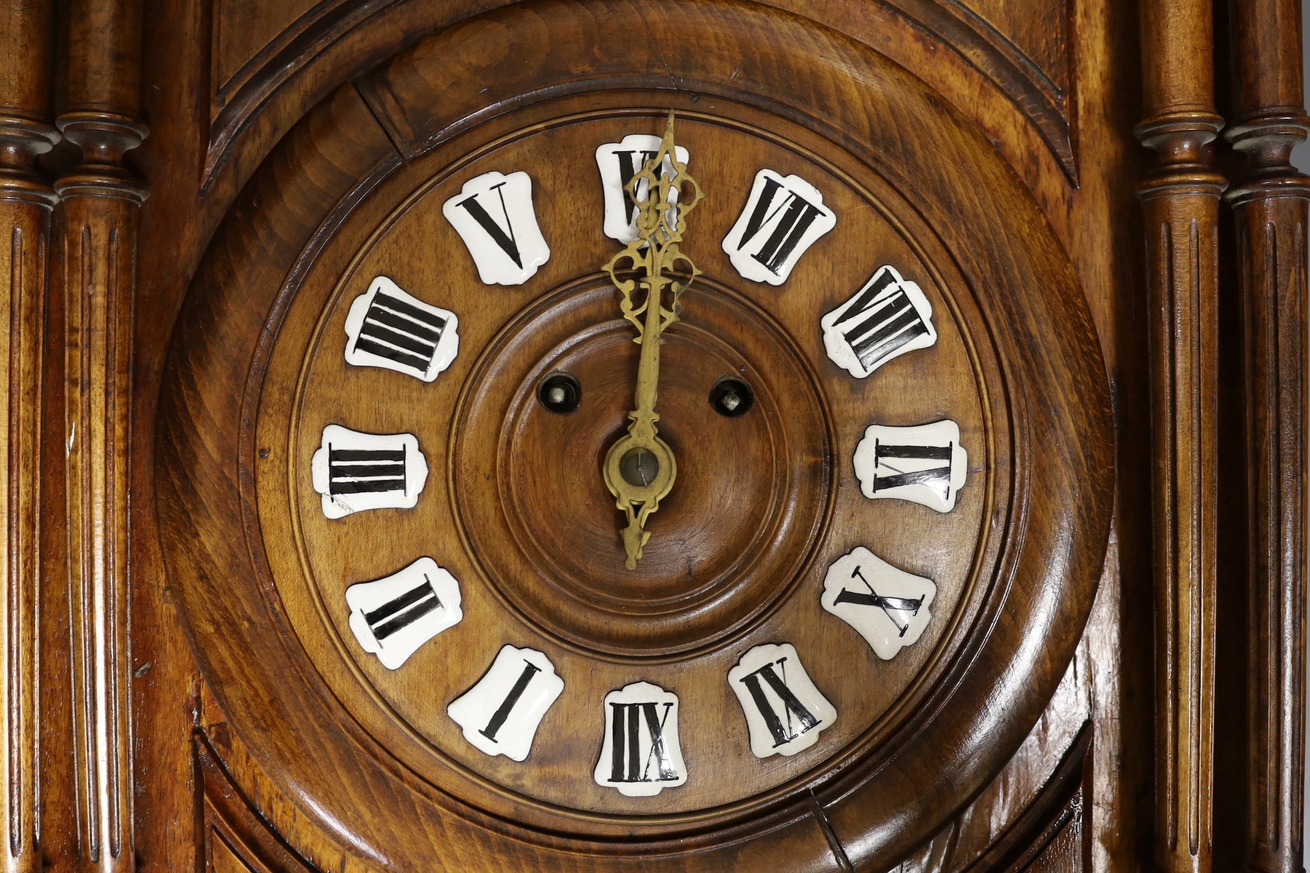 An early 20th century beech Vienna wall clock 69cm